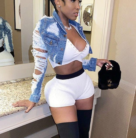 A Women's Denim Jacket With A Torn Cut
